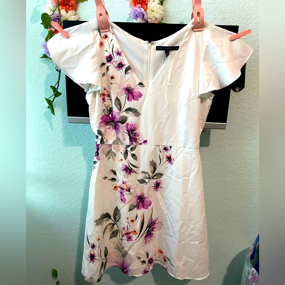 white dress with vibrant purple lilies